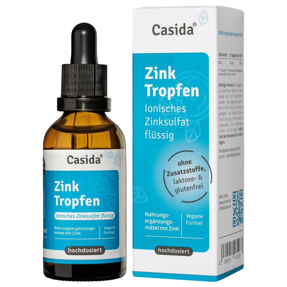 Eine Flasche mit Zink-Tropfen steht neben ihrer Verpackung.